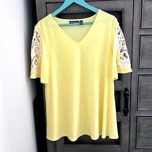 Nina Leonard yellow blouse with crochet sleeve design